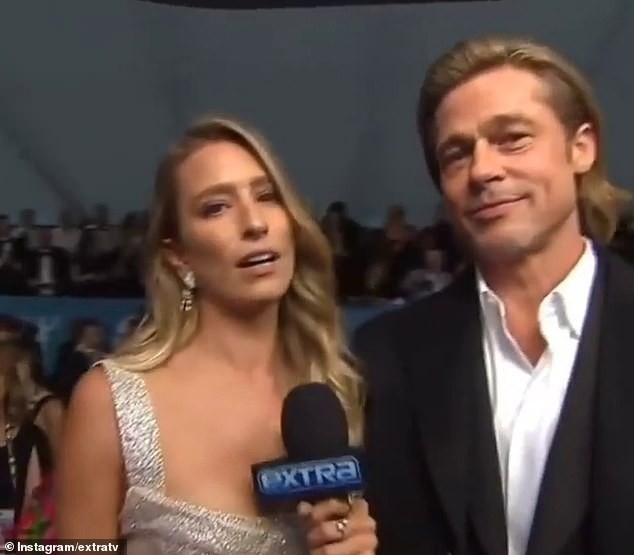 Tài tử Brad Pitt hẹn hò nữ phóng viên xinh đẹp người Australia?