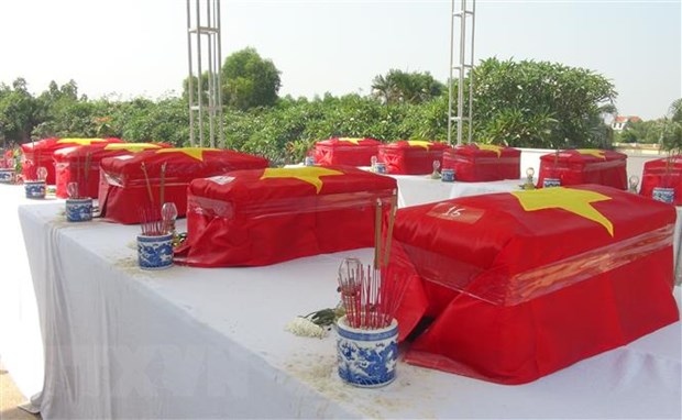 The reburial ceremony is held at the Doc Ba Dac Martyrs' Cemetery in the Mekong Delta province of An Giang