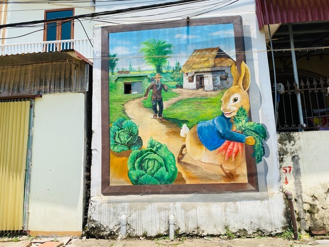 a close-up of largest mural paintings in hanoi picture 10