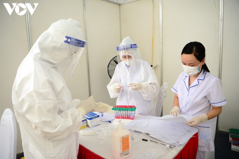 hanoi continues to conduct rt-pcr tests for returnees from da nang picture 13