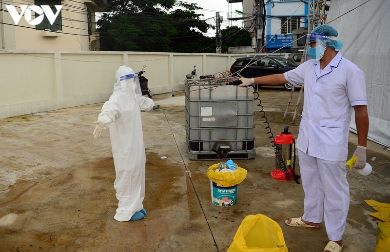 hanoi continues to conduct rt-pcr tests for returnees from da nang picture 15