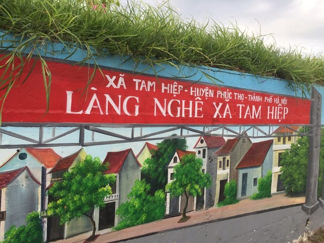 a close-up of largest mural paintings in hanoi picture 16