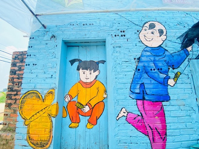 a close-up of largest mural paintings in hanoi picture 7