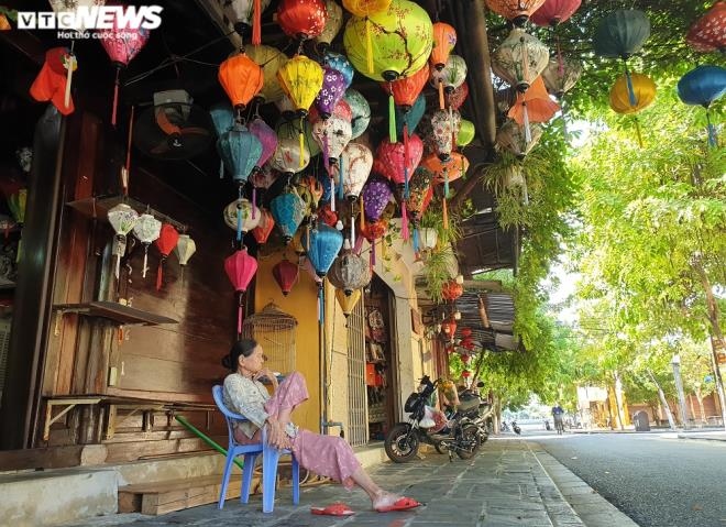 a view of hoi an on first day after lifting of social distancing order picture 8