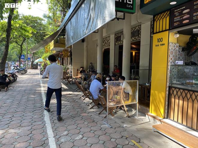 hanoi cafes seek to follow social distancing measures picture 1