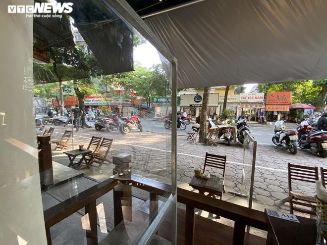 hanoi cafes seek to follow social distancing measures picture 2