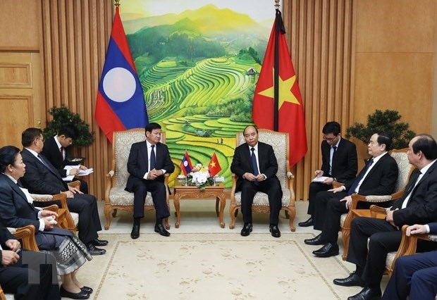 vietnam, laos destined to step up all-around cooperation picture 1