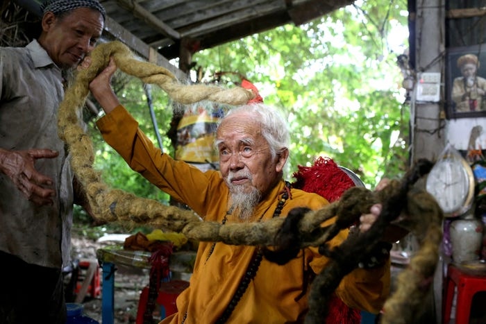 local elderly man with five-metre long hair among strangest photos of the year picture 1