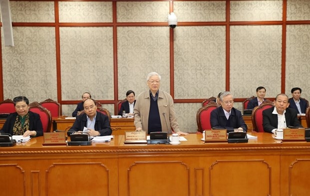 Party General Secretary and State President Nguyen Phu Trong (standing) addresses the Politburo meeting in Hanoi on December 8 (Photo: VNA)