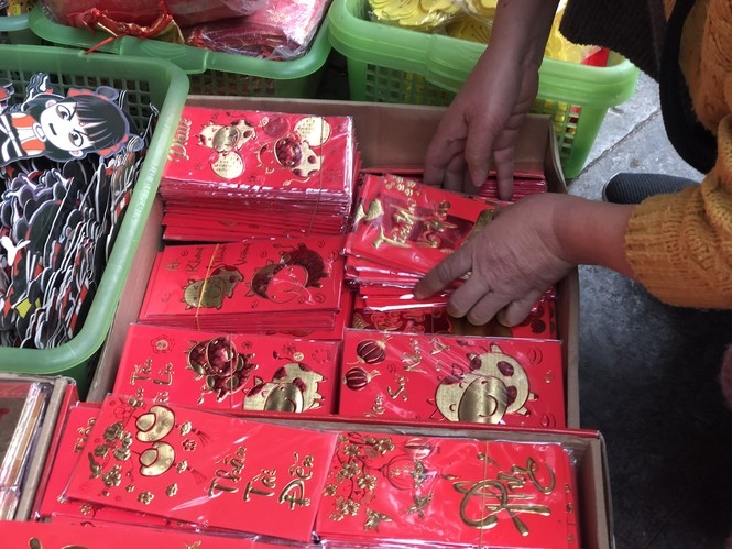 bustling hanoi street gears up for upcoming tet holiday picture 9