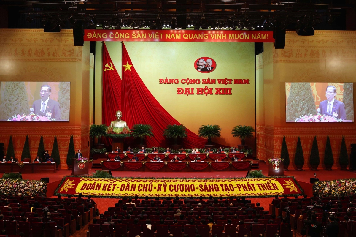 Các đại biểu làm việc tại Đại hội Đảng lần thứ XIII trong ngày 28/1. 