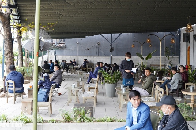 hanoi coffee shops busy after reopening on march 2 picture 1