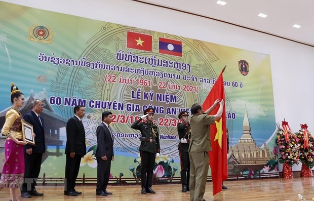 vientiane ceremony marks 60 years of vietnam s public security expert force in laos picture 1