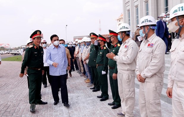 lao leader hails progress of vietnamese-funded na building picture 1