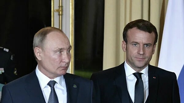 Tổng thống Nga V.Putin và Tổng thống Pháp E.Macron. (Nguồn: rianovosti)