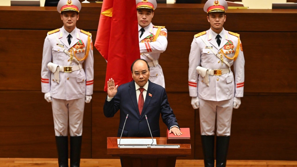 Politburo member Nguyen Xuan Phuc takes an oath at a swearing-in ceremony in Hanoi on April 5.