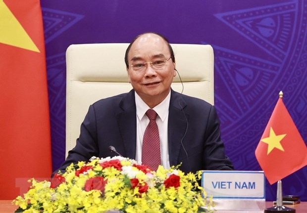Chủ tịch nước Nguyễn Xuân Phúc tại điểm cầu Hà Nội. (Ảnh: Thống Nhất/TTXVN)