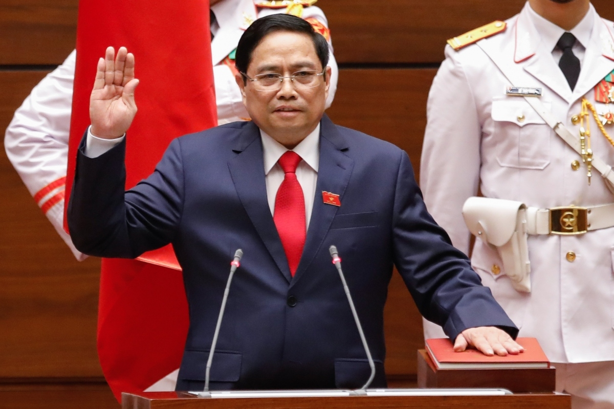 Newly elected PM Pham Minh Chinh takes an oath in Hanoi on April 5.