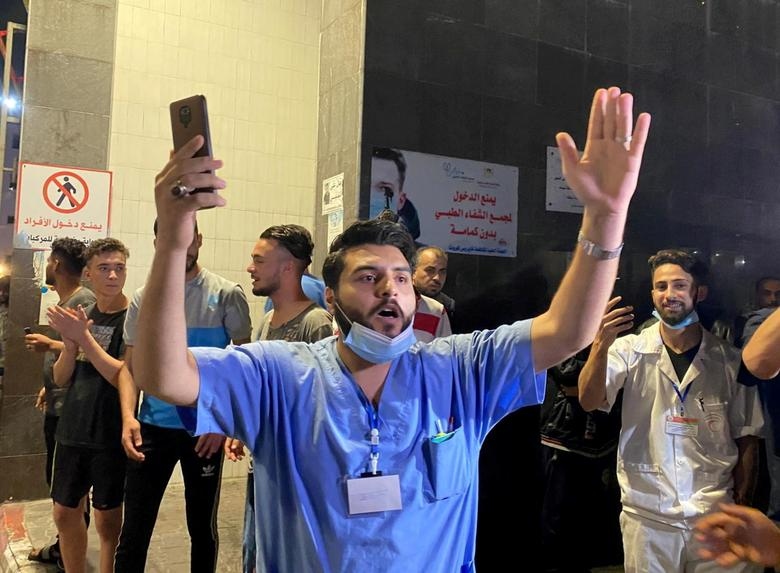 Người dân Gaza ăn mừng sau khi lệnh ngừng bắn giữa Israel và Hamas có hiệu lực. Ảnh: Reuters