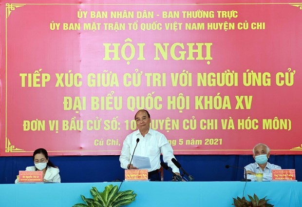 state president nguyen xuan phuc meets hcm city voters picture 1