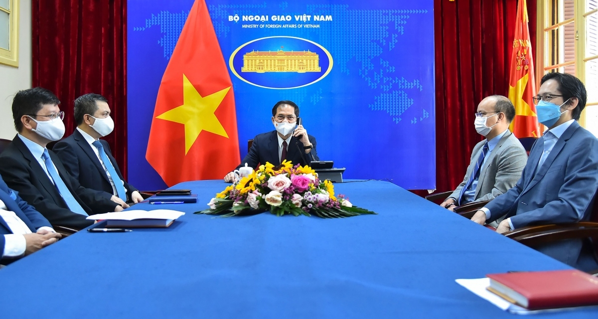 Foreign Minister Bui Thanh Son joins the phone talks from Hanoi, Vietnam.