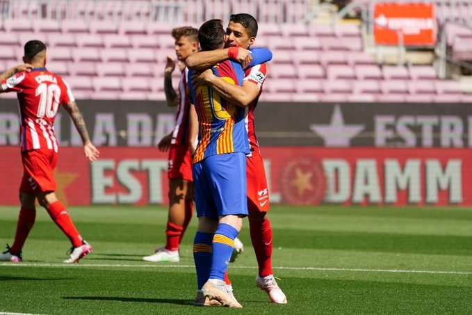 Lionel Messi tái ngộ bạn thân Luis Suarez. (Ảnh: Getty)