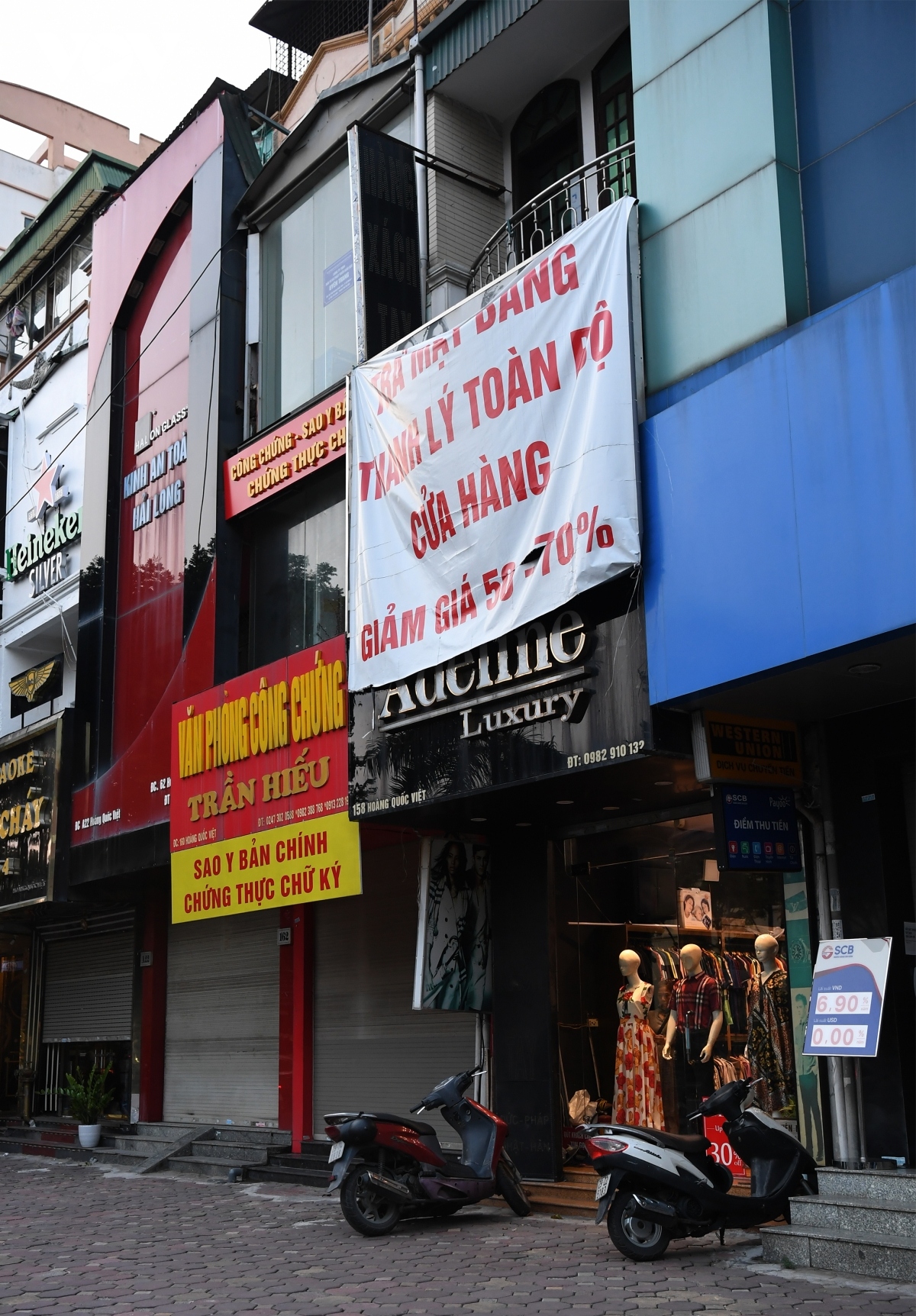 hanoi business outlets hit hard by latest covid-19 restrictions picture 7