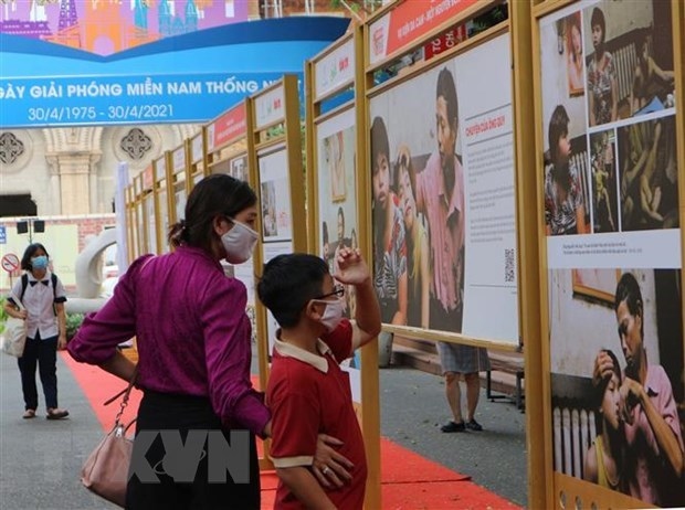 exhibition on ao dioxin pain, lawsuit underway in hcm city picture 1