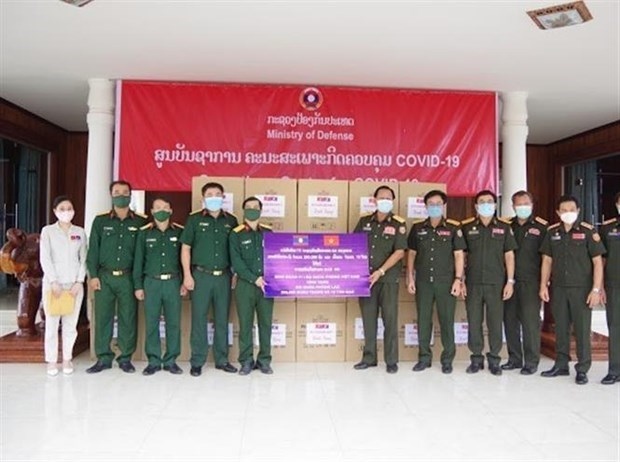 vietnamese community helps laos combat covid-19 picture 1
