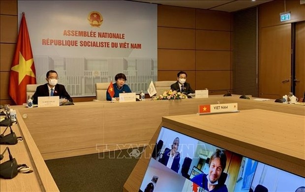 Chairwoman of the APF’s Vietnam Sub-Committee Nguyen Thuy Anh (centre) speaks at the Meeting of the Parliamentary Assembly of the Francophonie (APF)’s Parliamentary Affairs Committee via video teleconference on May 31.