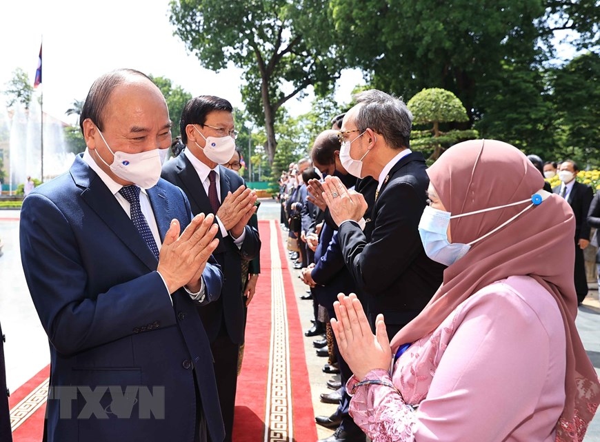 welcome ceremony for top lao leader in hanoi picture 4