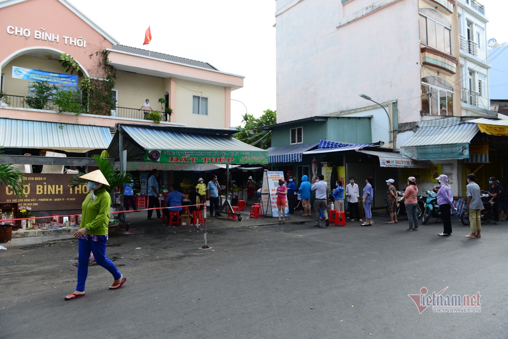 market in hcm city issues coupons to locals amid covid-19 fight picture 1
