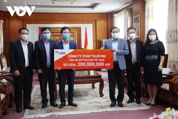 vietnam - laos jv contributes to national vaccine fund picture 1