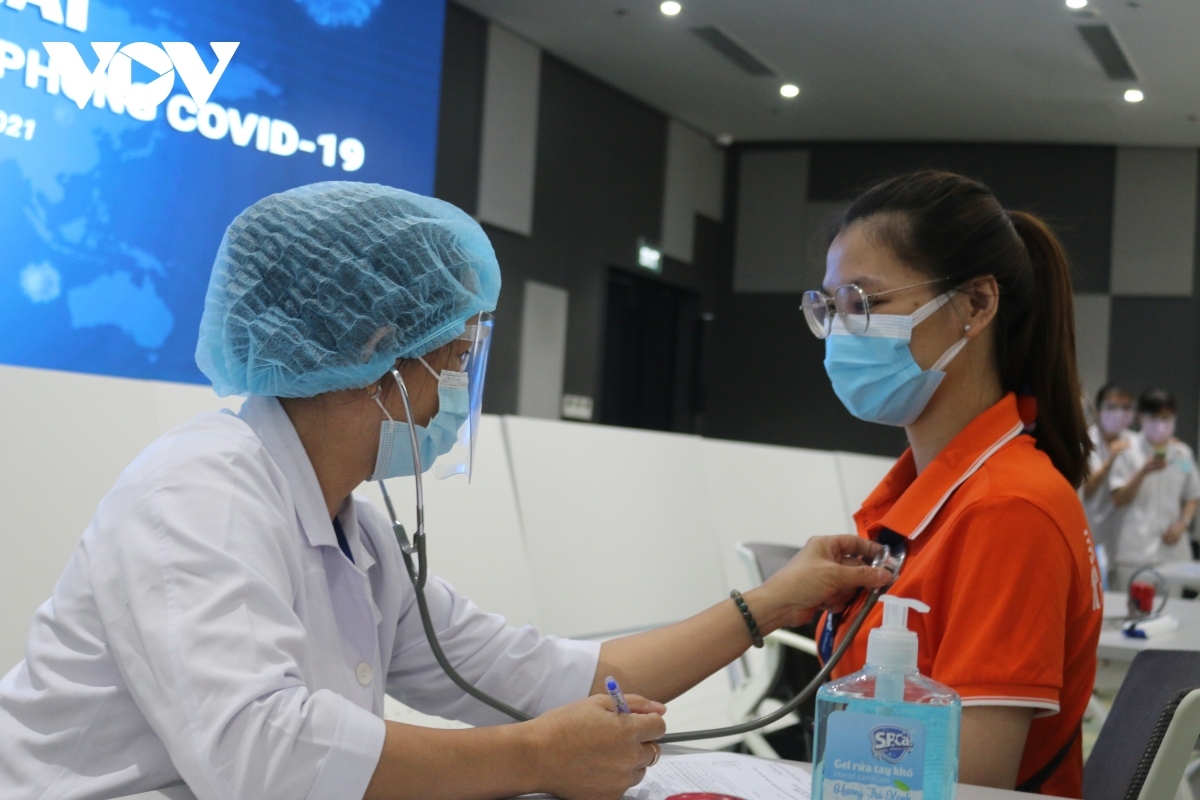 hcm city launches historic covid-19 vaccination campaign picture 12
