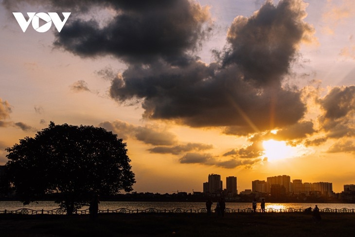 beautiful sunset on hanoi s west lake picture 1