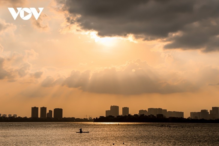 beautiful sunset on hanoi s west lake picture 3