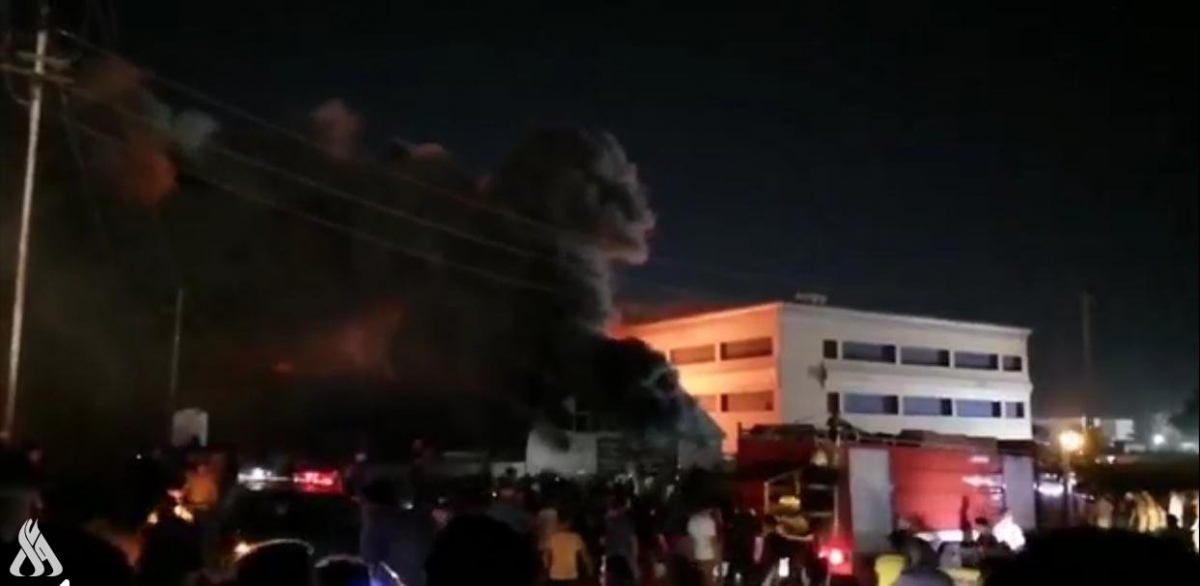 Hiện trường đám cháy ở bệnh viện Imam Hussein. Nguồn: INA