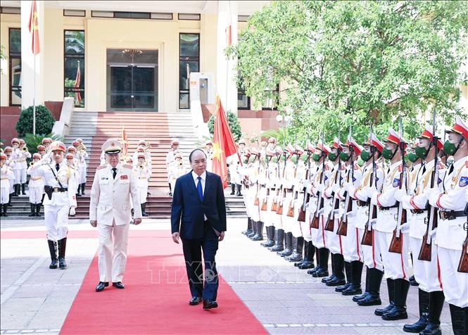 Chủ tịch nước Nguyễn Xuân Phúc dự lễ kỷ niệm 75 năm ngày truyền thống lực lượng An ninh nhân dân
Ảnh: Thống Nhất/TTXVN