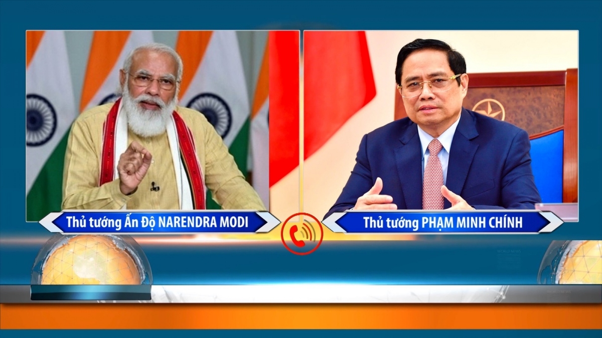Prime Minister Pham Minh Chinh (R) and his Indian counterpart Narendra Modi, examine ways of further promoting the Vietnam - India Comprehensive Strategic Partnership in future during their phone talks on July 10.