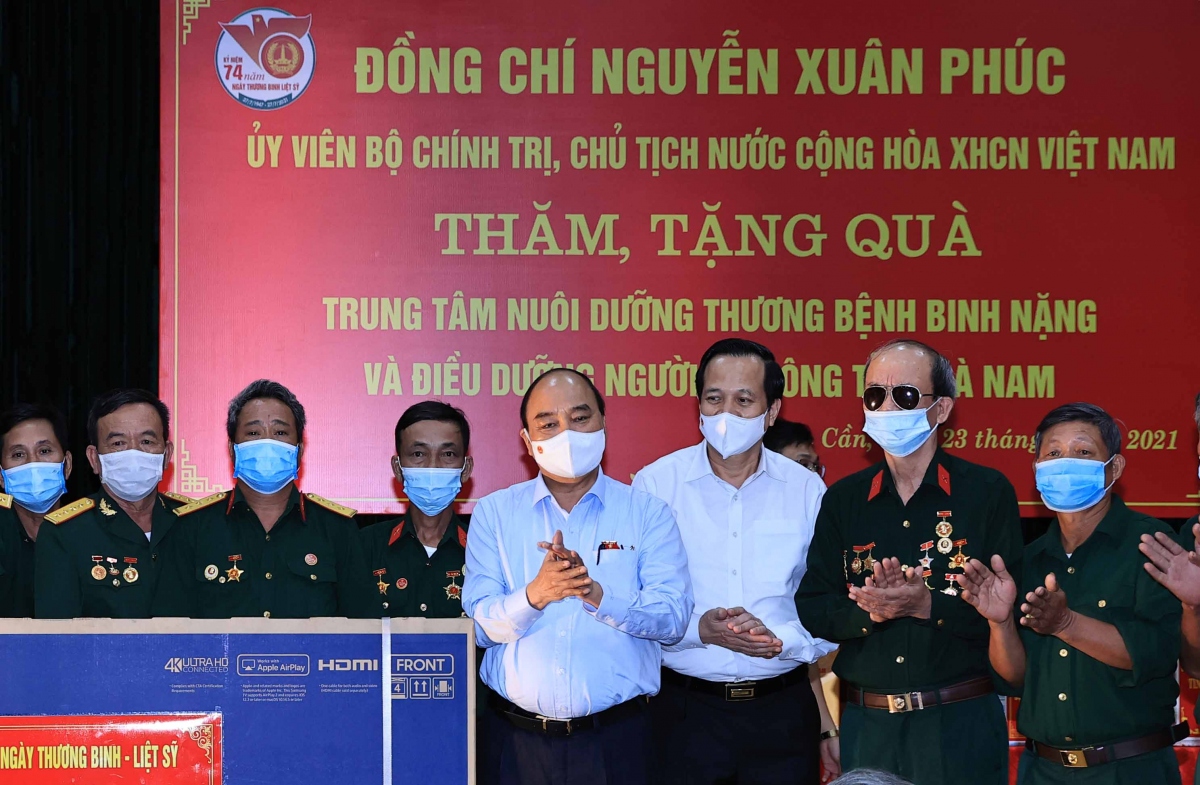 Dang, nha nuoc tiep tuc quan tam nhieu hon nua den cac thuong binh, gia dinh liet si hinh anh 3