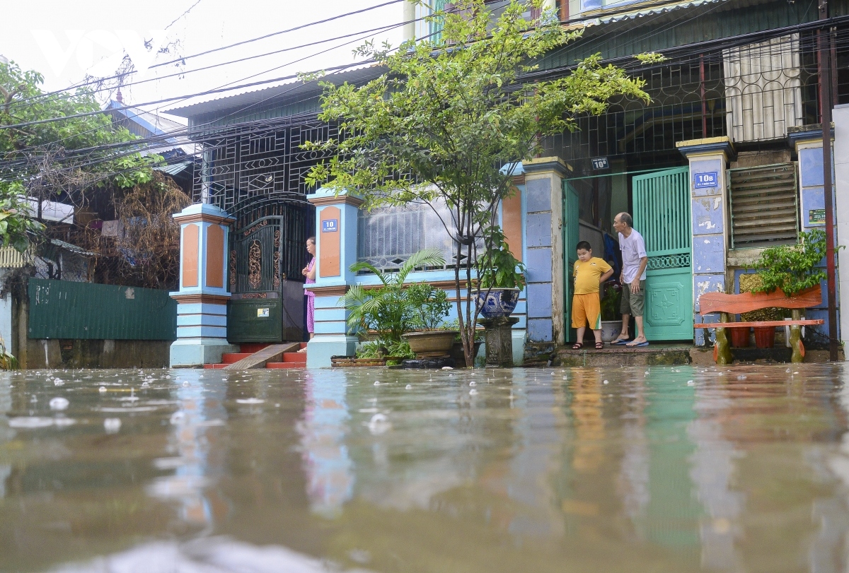 Dirty flood water inundates streets throughout the city, having a negative influence on the daily lives of local people.