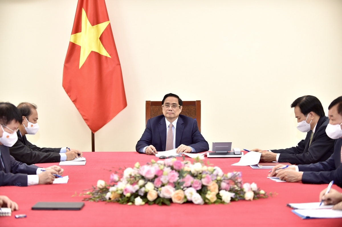 PM Pham Minh Chinh and other Government officials during their phone talks from Hanoi.