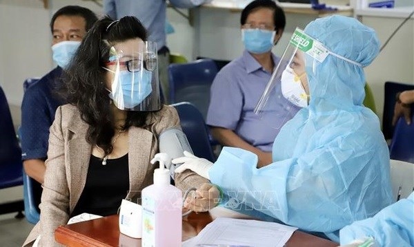 hcm city asks for additional 7,000 medical staff to control covid-19 picture 1