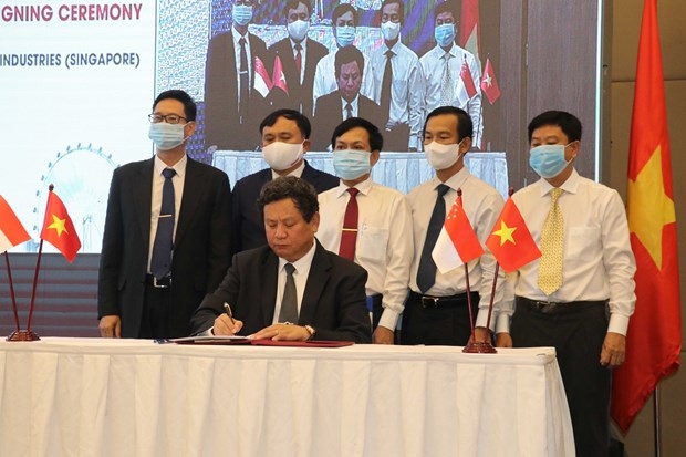 electricity corporation, singaporean group sign strategic cooperation agreement picture 1