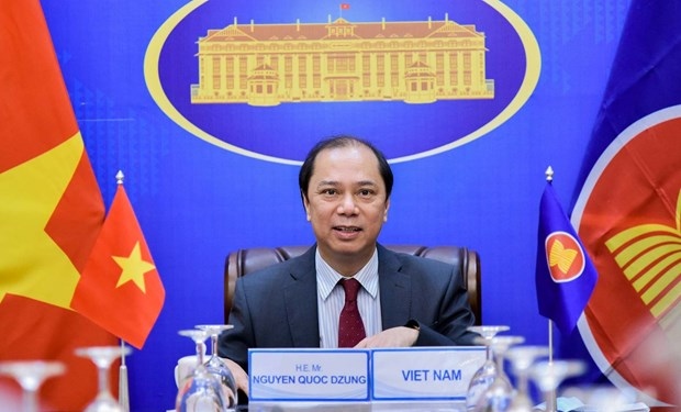 Deputy Foreign Minister Nguyen Quoc Dung attends the meeting. (Photo: The World &amp; Vietnam Report)