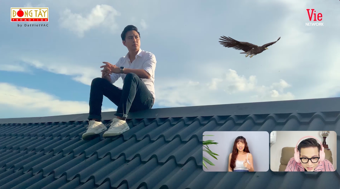 Thanh Duy leo lên nóc nhà để quay MV.