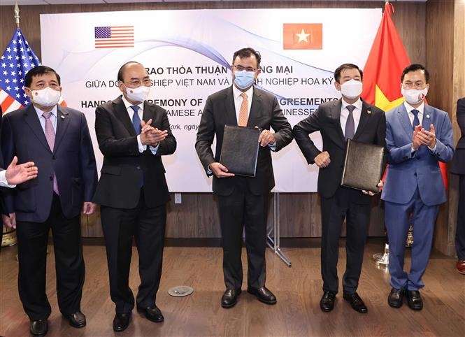 Chủ tịch nước Nguyễn Xuân Phúc chứng kiến Lễ trao văn bản hợp tác giữa giữa Vingroup và Google (Ảnh: Thống Nhất/TTXVN)