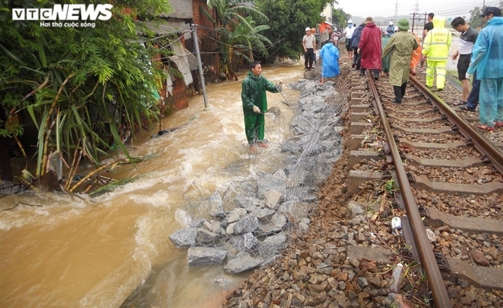 A section railway is disrupted due to flooding on October 24.