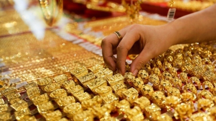 Giá vàng trong nước giảm ngược chiều với vàng thế giới. (Ảnh: KT)