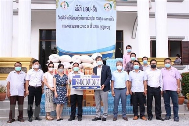 vietnamese raise fund in support of luang prabang s covid-19 fight picture 1